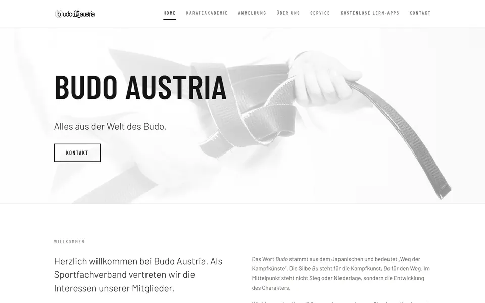 Startseite von budo-austria.at mit großem Schriftzug Budo Austria über einem hellen Foto eines Karategürtels